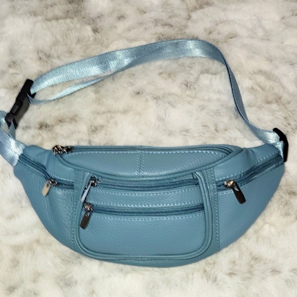 Belly pack blue cowhide leather.  Very soft and lots of pockets.